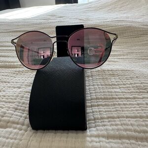 Prada Round Sunglasses with Pink Lenses